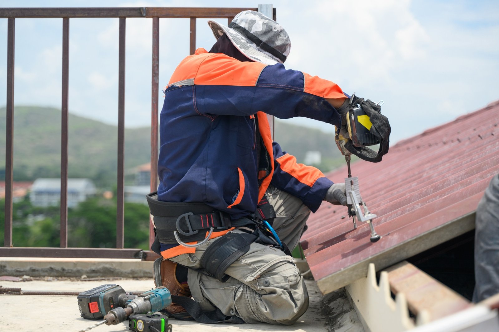 Professional engineer worker installing solar panels system on rooftop